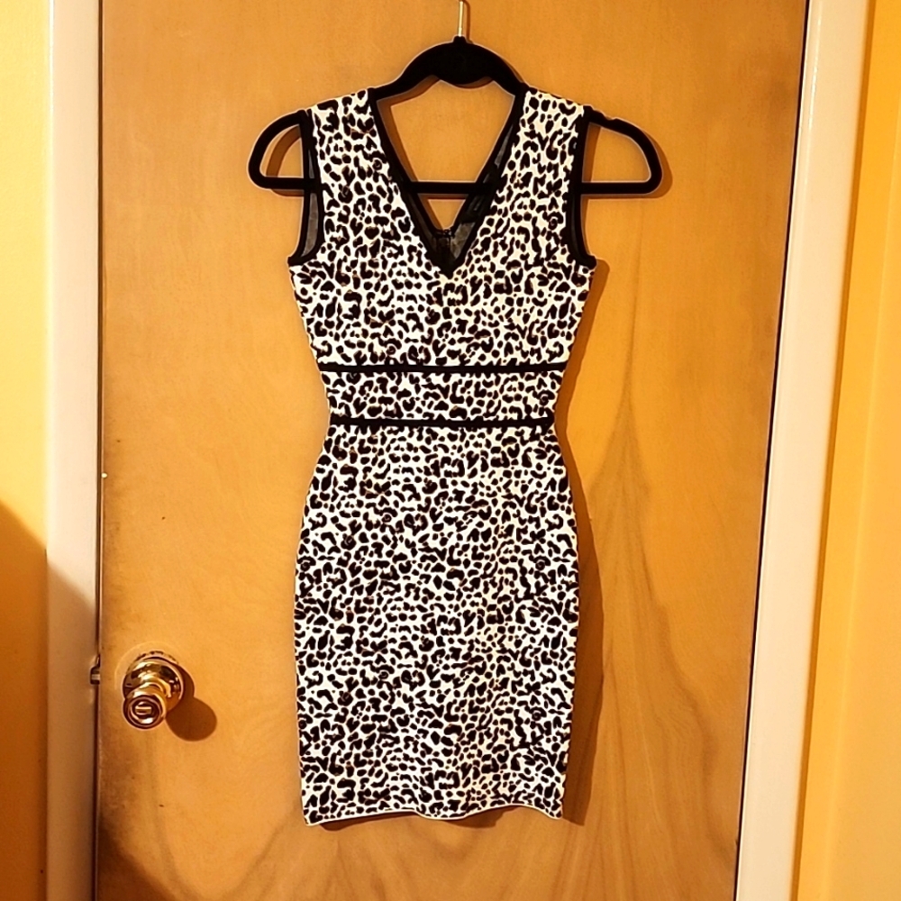 Fancy leopard, body cone,mini dress.beautiful,thick material size xs
